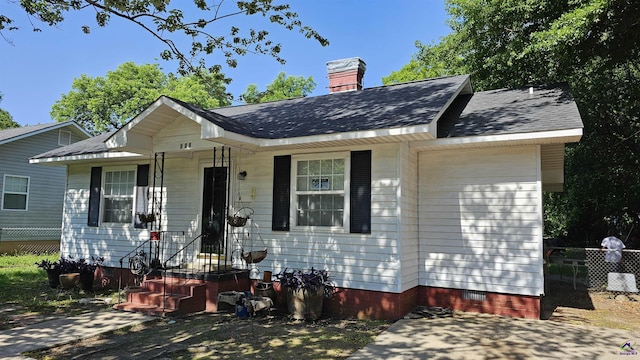 129 Tinker Blvd, Warner Robins, GA 31093 - view of front of home with crawl space, roof with shingles, and a chimney