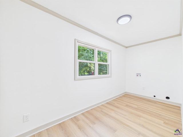 744 Corbin Ave, Macon, GA 31204 - empty room with wood finished floors, ornamental molding, and baseboards