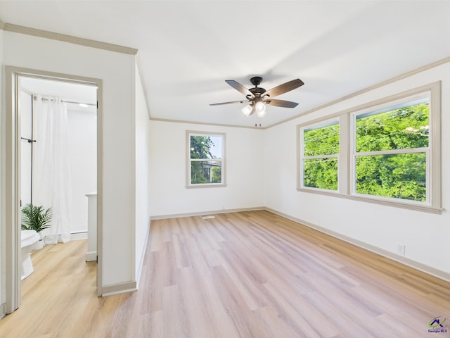 744 Corbin Ave, Macon, GA 31204 - unfurnished bedroom with light wood-type flooring, baseboards, ornamental molding, and ceiling fan
