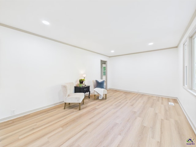 744 Corbin Ave, Macon, GA 31204 - living area featuring wood finished floors, baseboards, recessed lighting, and ornamental molding