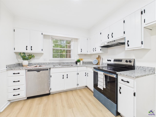 3081 Tiffin Cir, Macon, GA 31204 - kitchen featuring stainless steel appliances, under cabinet range hood, light wood-type flooring, and white cabinets
