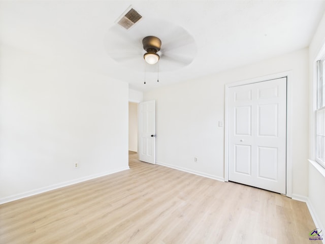 3081 Tiffin Cir, Macon, GA 31204 - unfurnished bedroom with light wood-style flooring, baseboards, and ceiling fan