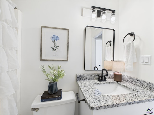 3081 Tiffin Cir, Macon, GA 31204 - bathroom featuring toilet and vanity