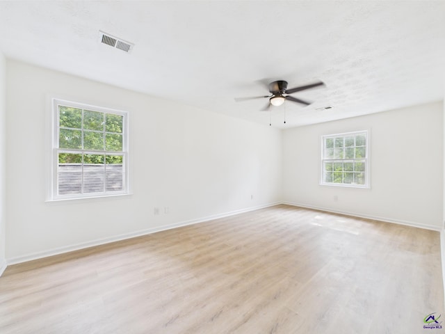3081 Tiffin Cir, Macon, GA 31204 - unfurnished room featuring a ceiling fan, light wood finished floors, and baseboards
