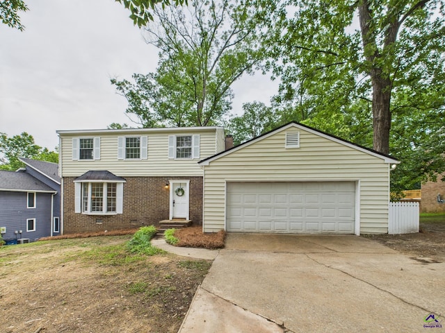 3081 Tiffin Cir, Macon, GA 31204 - traditional-style home featuring driveway, brick siding, and a garage