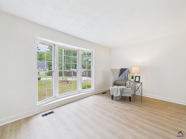 3081 Tiffin Cir, Macon, GA 31204 - unfurnished room featuring wood finished floors, plenty of natural light, and baseboards
