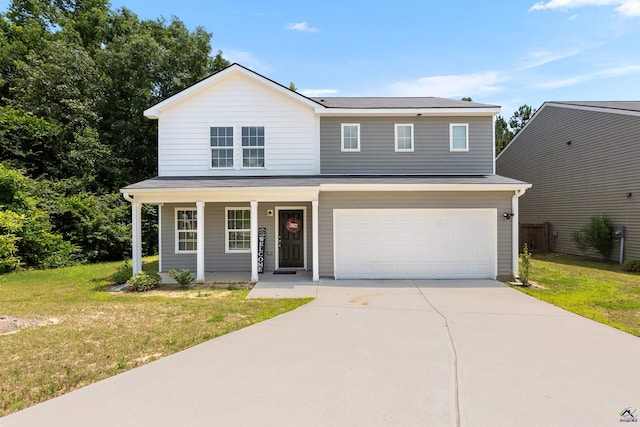 630 Ivy Brook Way, Macon, GA 31210 - traditional home with covered porch, a garage, a front lawn, and driveway