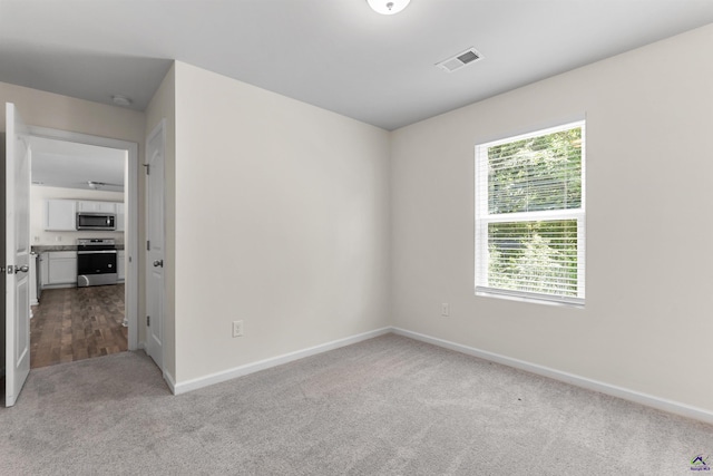 630 Ivy Brook Way, Macon, GA 31210 - empty room featuring carpet flooring, plenty of natural light, and baseboards