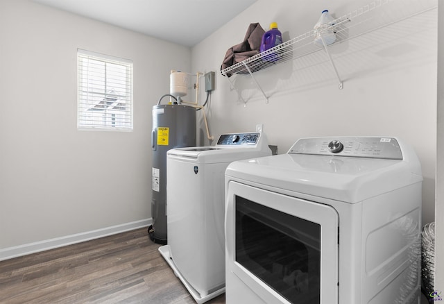 630 Ivy Brook Way, Macon, GA 31210 - washroom featuring electric water heater, washer and clothes dryer, wood finished floors, and baseboards