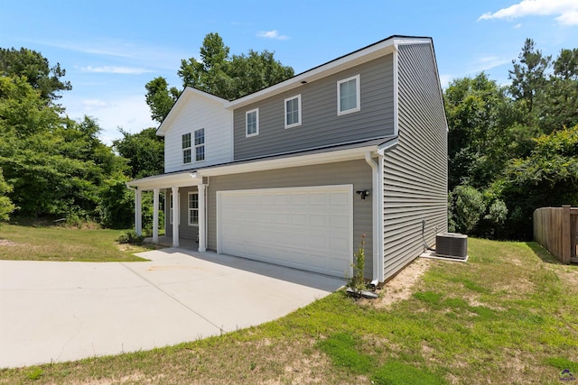 630 Ivy Brook Way, Macon, GA 31210 - view of front of property featuring concrete driveway, a garage, and central AC