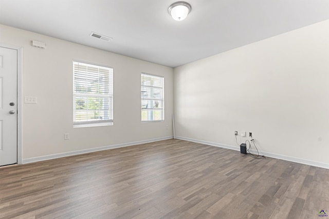 630 Ivy Brook Way, Macon, GA 31210 - spare room featuring wood finished floors and baseboards