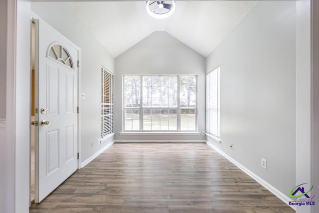 319 Smithville Church Rd, Warner Robins, GA 31088 - unfurnished room featuring vaulted ceiling, wood finished floors, and baseboards