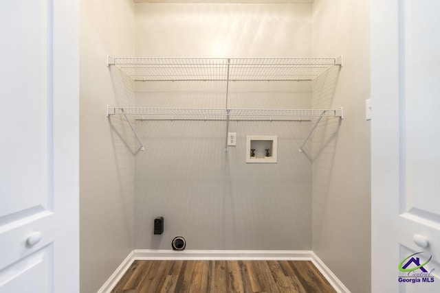 319 Smithville Church Rd, Warner Robins, GA 31088 - laundry area featuring washer hookup, dark wood-type flooring, hookup for an electric dryer, and baseboards