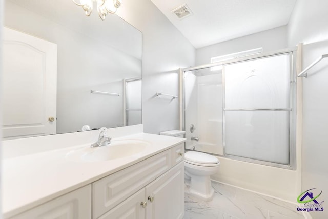 319 Smithville Church Rd, Warner Robins, GA 31088 - bathroom with vanity, toilet, combined bath / shower with glass door, and marble finish flooring