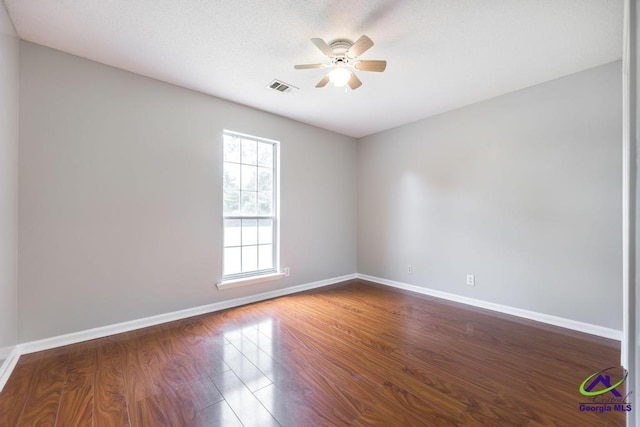 319 Smithville Church Rd, Warner Robins, GA 31088 - empty room with ceiling fan, baseboards, and dark wood-type flooring