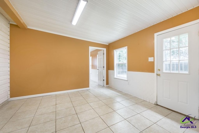 319 Smithville Church Rd, Warner Robins, GA 31088 - foyer with light tile patterned flooring, wainscoting, and baseboards