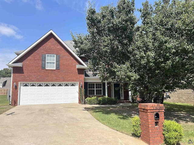 103 Lattice Bnd, Bonaire, GA 31005 - traditional-style home featuring brick siding, concrete driveway, and a garage