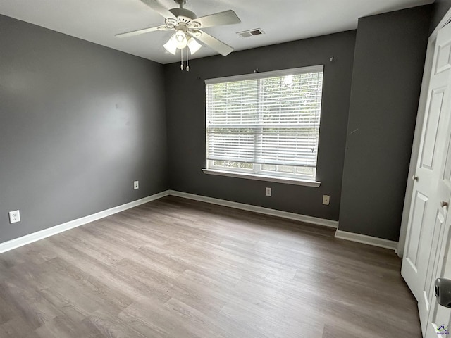 103 Lattice Bnd, Bonaire, GA 31005 - unfurnished bedroom featuring wood finished floors, baseboards, and ceiling fan