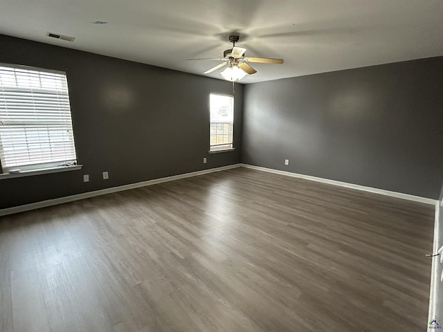 103 Lattice Bnd, Bonaire, GA 31005 - spare room featuring a ceiling fan, wood finished floors, and baseboards