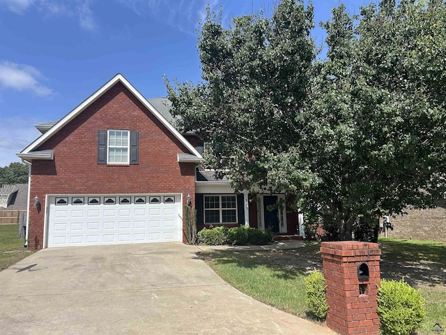 103 Lattice Bnd, Bonaire, GA 31005 - view of front of home featuring brick siding, driveway, and a garage