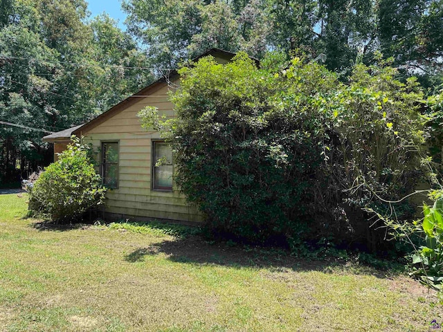 4723 Massey Rd, Macon, GA 31206 - view of side of home featuring a lawn