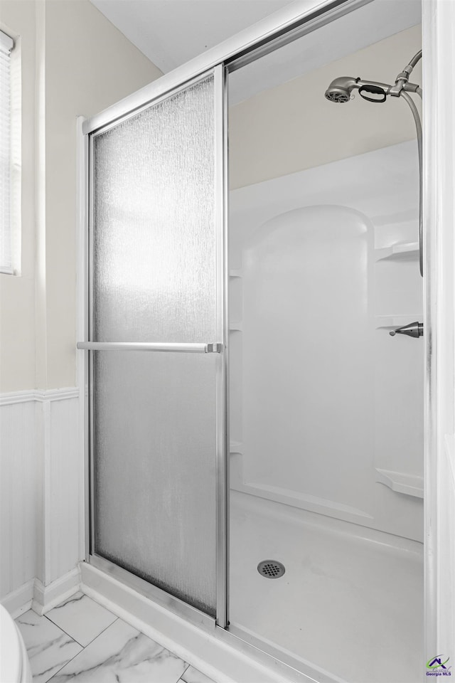 202 Kimberly Rd, Warner Robins, GA 31093 - full bathroom with a shower stall and marble look tiles