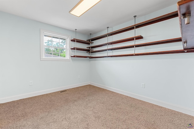 202 Kimberly Rd, Warner Robins, GA 31093 - carpeted spare room with baseboards