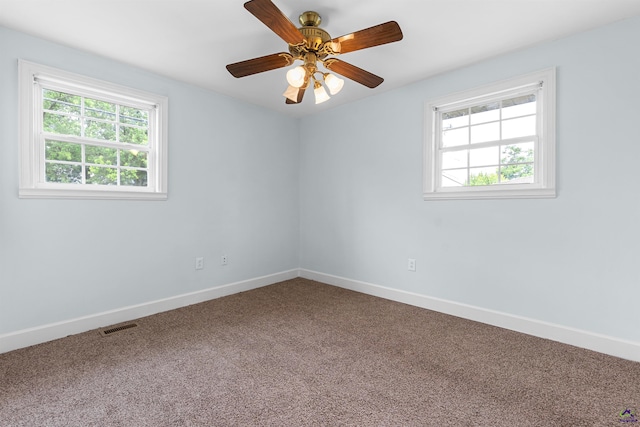 202 Kimberly Rd, Warner Robins, GA 31093 - unfurnished room with healthy amount of natural light, carpet floors, baseboards, and ceiling fan