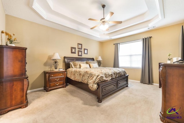 201 Loudon Hill Dr, Warner Robins, GA 31088 - bedroom featuring a raised ceiling, light carpet, baseboards, and ceiling fan