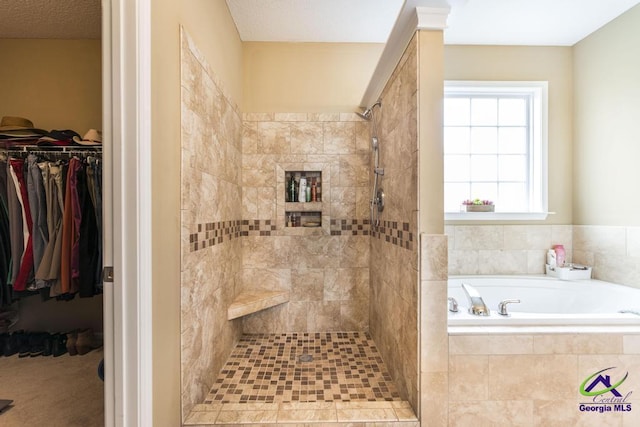 201 Loudon Hill Dr, Warner Robins, GA 31088 - full bathroom featuring a garden tub, tiled shower, and a spacious closet