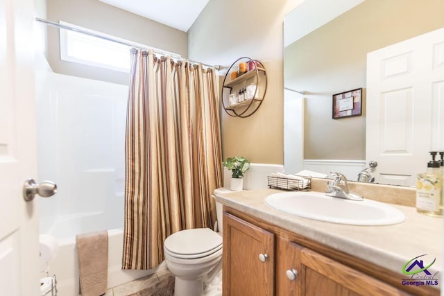 201 Loudon Hill Dr, Warner Robins, GA 31088 - full bath with vanity, toilet, and shower / bathtub combination with curtain