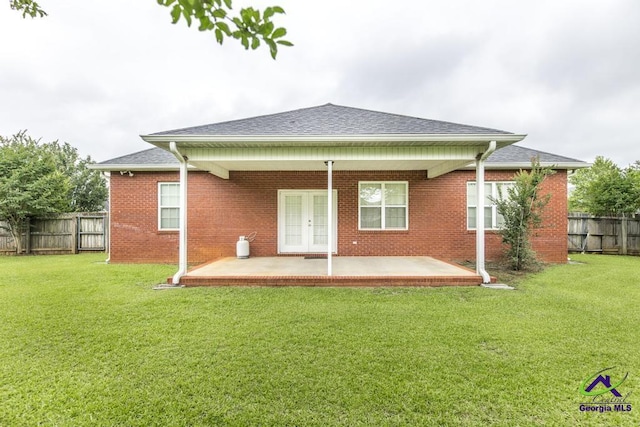 201 Loudon Hill Dr, Warner Robins, GA 31088 - rear view of property featuring a patio area, french doors, brick siding, and roof with shingles