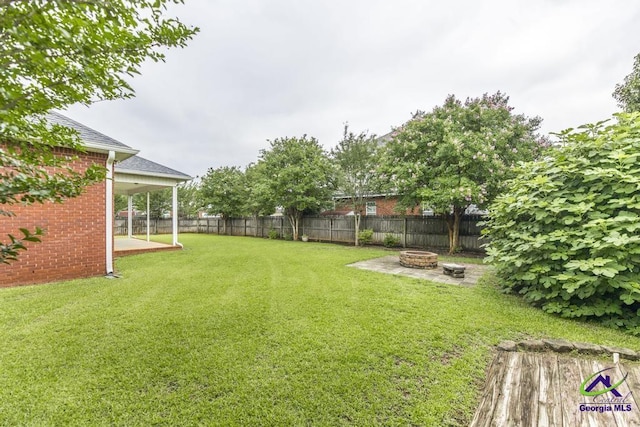 201 Loudon Hill Dr, Warner Robins, GA 31088 - view of yard with a fire pit and a patio area