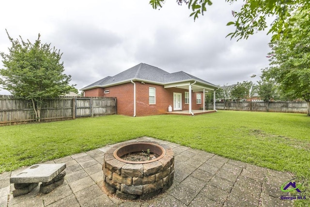 201 Loudon Hill Dr, Warner Robins, GA 31088 - view of patio / terrace featuring a fire pit