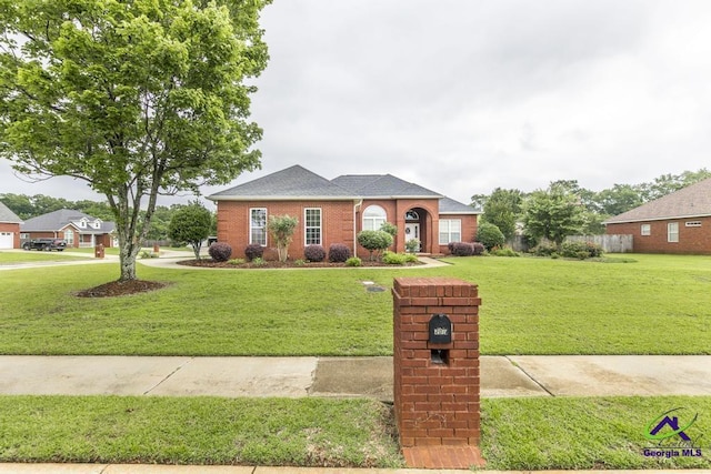 201 Loudon Hill Dr, Warner Robins, GA 31088 - view of front of home featuring a front lawn and brick siding