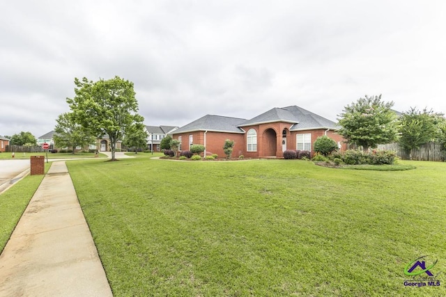 201 Loudon Hill Dr, Warner Robins, GA 31088 - single story home with a front lawn, brick siding, and a shingled roof
