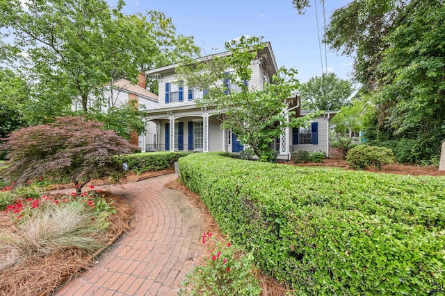 938 Park Pl, Macon, GA 31201 - italianate home featuring a porch