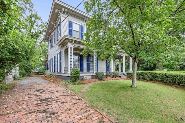 938 Park Pl, Macon, GA 31201 - italianate-style house featuring covered porch and a front lawn