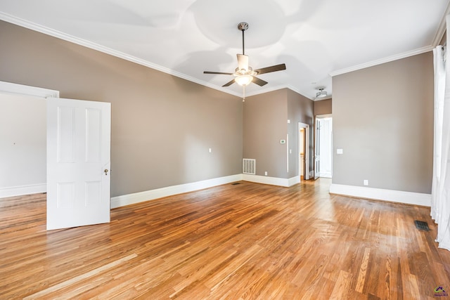938 Park Pl, Macon, GA 31201 - spare room featuring ceiling fan, light wood-style floors, baseboards, and ornamental molding