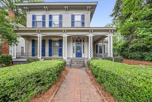 938 Park Pl, Macon, GA 31201 - italianate house with a porch