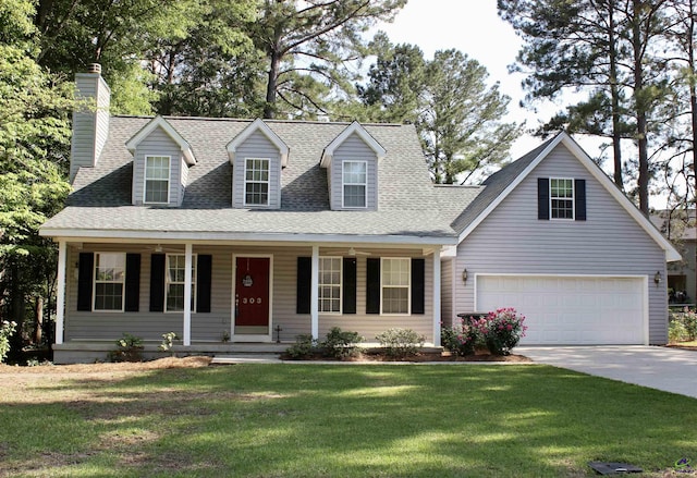 303 Shane, Perry, GA 31069 - new england style home featuring a shingled roof, concrete driveway, a porch, a front lawn, and a garage