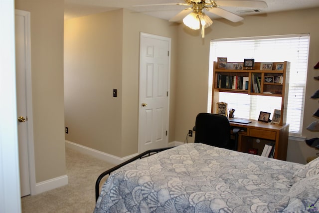 303 Shane, Perry, GA 31069 - bedroom with carpet, baseboards, ceiling fan, and a desk