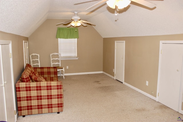 303 Shane, Perry, GA 31069 - sitting room with carpet, lofted ceiling, a ceiling fan, baseboards, and a textured ceiling