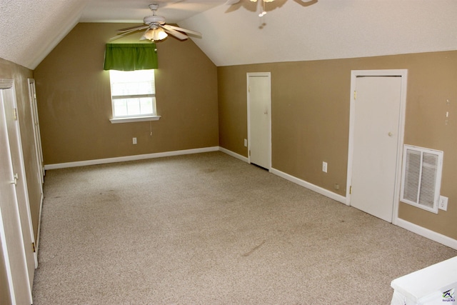 303 Shane, Perry, GA 31069 - additional living space with a ceiling fan, carpet, lofted ceiling, and baseboards