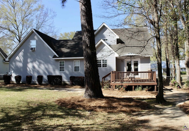 303 Shane, Perry, GA 31069 - rear view of house with a deck, a yard, roof with shingles, and french doors