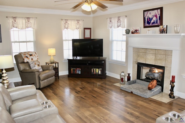 303 Shane, Perry, GA 31069 - living area featuring ceiling fan, ornamental molding, wood finished floors, a fireplace, and baseboards