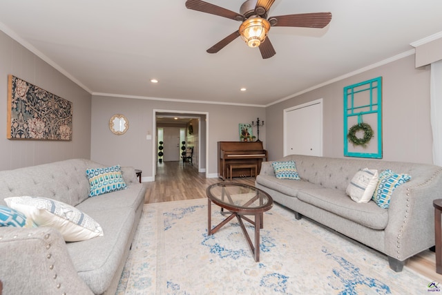 826 Edward Pl, Macon, GA 31204 - living area with wood finished floors, crown molding, recessed lighting, ceiling fan, and baseboards