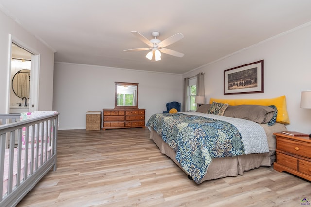 826 Edward Pl, Macon, GA 31204 - bedroom with light wood-type flooring, crown molding, and ceiling fan