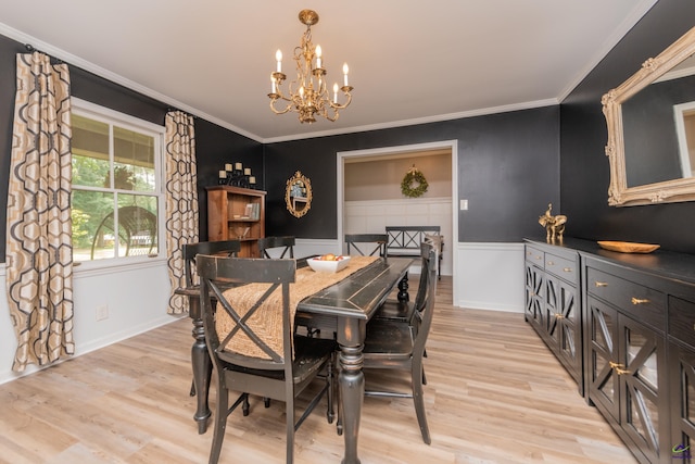 826 Edward Pl, Macon, GA 31204 - dining space with a chandelier, a wainscoted wall, light wood-type flooring, and crown molding