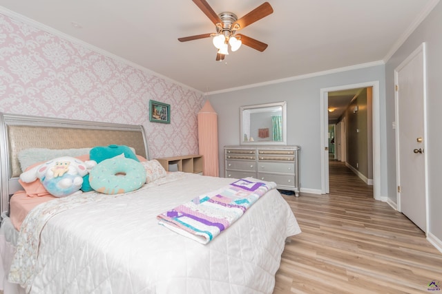 826 Edward Pl, Macon, GA 31204 - bedroom with wallpapered walls, ornamental molding, wood finished floors, baseboards, and ceiling fan